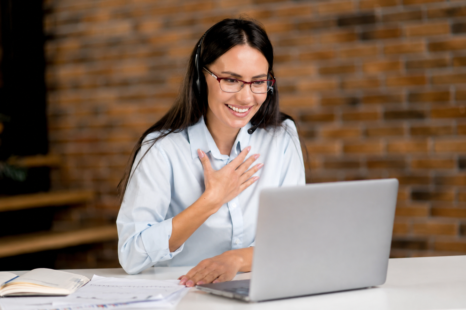 Woman practicing interview responses with a headset